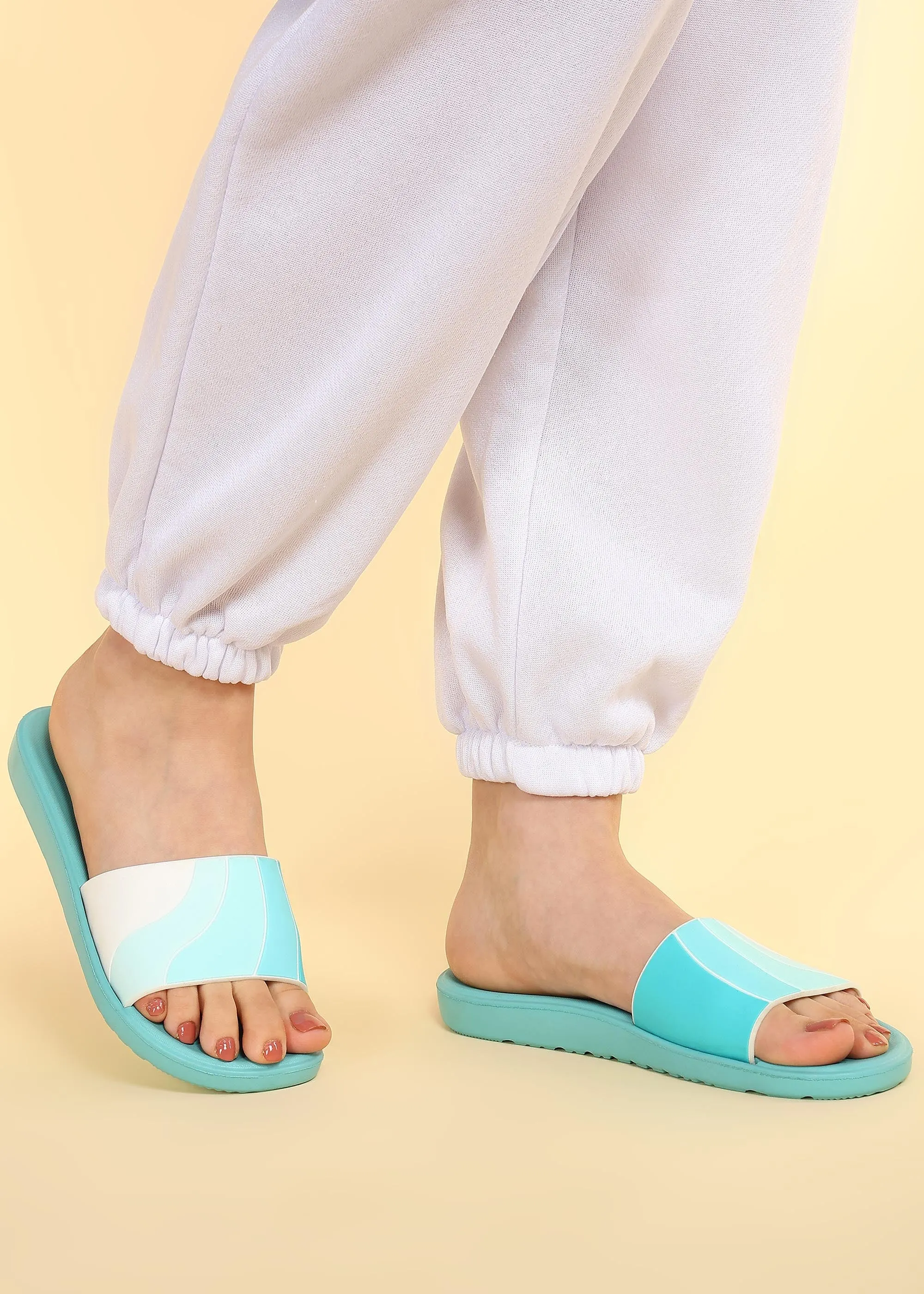 Daylong Comfort Streamlined Paragon Women's Ice Green Sliders with Cushioned Sole for Everyday Use